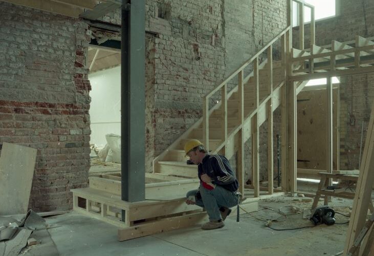 A contractor building the interior of the museum, the area which is now the foyer.
